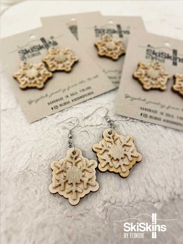 murtomaasuksiskinistä tehdyt valkoiset lumihiutalekorvikset