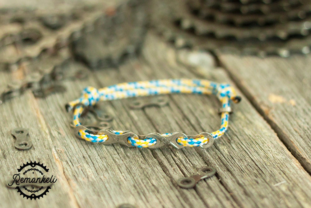 Remankeli cord bracelet with bicycle chain links