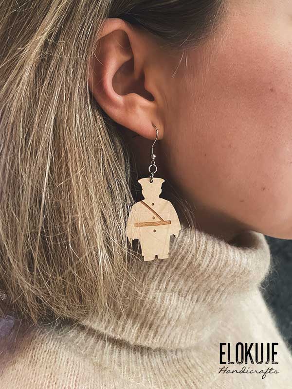 Toripolliisi earrings made of Finnish birch plywood
