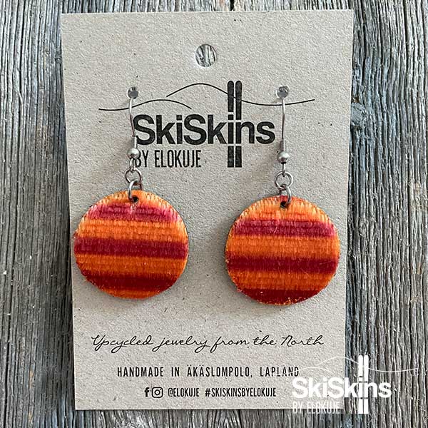SkiSkins-korvikset, puna-oranssi ympyrä