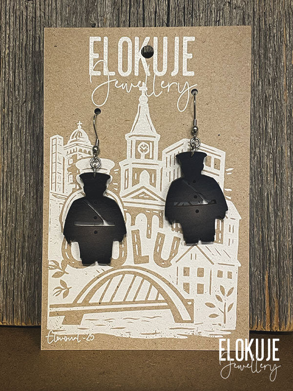 Toripolliisi earrings made of Finnish birch plywood